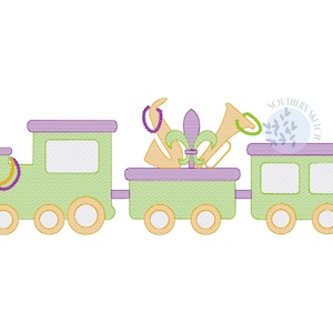 May include: A green toy train with purple accents and a yellow caboose. The train is decorated with a fleur-de-lis, trumpets, and beads, alluding to Mardi Gras. The text "SOUTHERN SKETCH" is visible in a circle above the train.