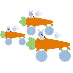 May include: Three embroidered bunny rabbits driving carrot-shaped cars with blue wheels. The bunnies are wearing blue hats and are holding the steering wheel. The carrots are orange and have green tops. The background is white.