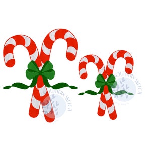 May include: Two red and white candy canes tied together with a green bow. The candy canes are in a crossed position.