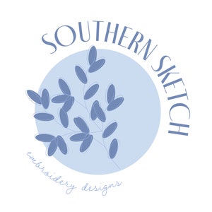 May include: A blue circle with the text "Southern Sketch embroidery designs" around the edge. Inside the circle is a stylized blue floral design.