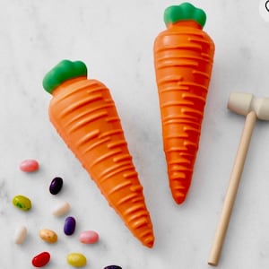 Easter Breakable Smash Chocolate -  2 large Carrots filled with fun Jelly Belly Jelly beans. Comes w/ 2 hammers. Individually wrapped.