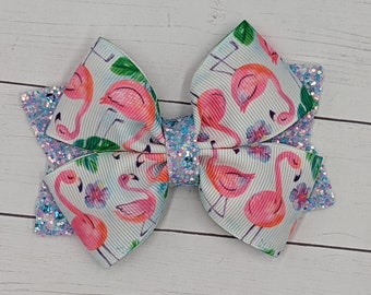 Tropical aqua blue green with pink flamingo print 4" Pin up hair bow clip Tropical aqua blue green with pink flamingo print 4" Pin up hair bow clip