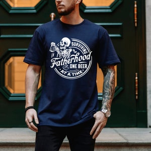 Surviving Fatherhood One Beer At A Time Shirt | Fathers Day Shirt | Shirt for Fathers | Gift For Dad | Husband Gift | Fatherhood Shirt