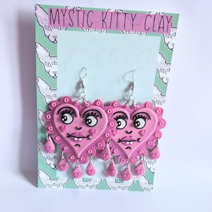 Scalloped edge pink goofy heart earrings/ polymer clay/ crying heart/ trad tattoo/ dangle/ big earrings/ sparkle/ shimmer