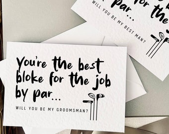 May include: Two white cards with black text and golf club illustrations. The top card says "You're the best bloke for the job by par... Will you be my best man?" The bottom card says "You're the best bloke for the job by par... Will you be my groomsman?"