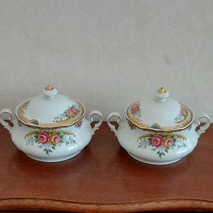 Soup tureens from Winterling Kirchenlamitz Bavaria beautifully decorated with pink roses blue flowers green leaves and lots of gold decoration