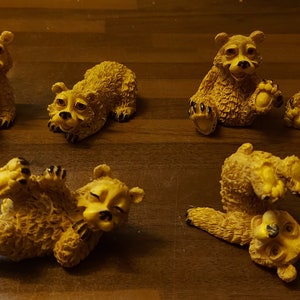 Bears, approximately 4 cm tall. 6 in total. Sold as a set.