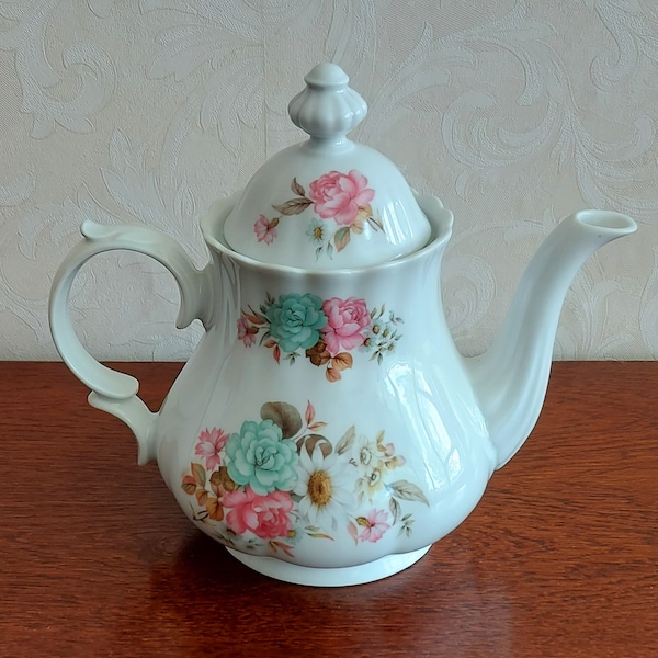 Spherical teapot by Retsch and Co Wunsiedel Bavaria Germany vintage 1960s decorated with pink blue and white flowers