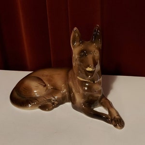 Image of brown sheepdog by Hubert Bequet Quaregnon made in Belgium. Vintage 60s in top condition and undamaged.