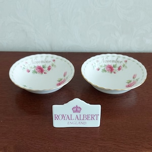 Porridge bowl from Royal Albert Bone China England Flower of the month series different months decorated with colored flowers and gold edge