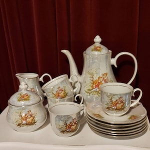 Beautiful rare coffee set from Wloclawek Porcelana made in Poland white lilac color with mother of pearl effect with romantic picture