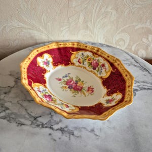 Oval small candy dish from Royal Albert Bone China England Lady Hamilton decorated with colored flowers and gold rim vintage 60s