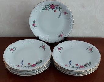 Kleine platte diner borden van Wawel made in Poland versierd met felle gekleurde bloemen en goud omrand Vintage jaren 60