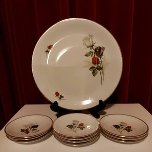 Pastry set from Gebrüder Winterling AG Bavaria Germany consisting of a bowl and 10 plates decorated with white, black and red roses and gold edging