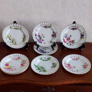 Royal Albert Bone China Flower of the month multiple cake plates of different months. Richly decorated with flowers and gold rim