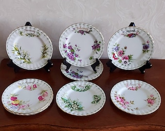Royal Albert Bone China Flower of the month multiple cake plates of different months. Richly decorated with flowers and gold rim