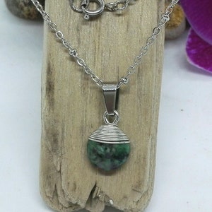 Stainless steel chain with a small ruby zoisit pendant