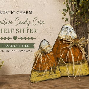 May include: Two triangular candy corn shelf sitters with distressed white, orange, and yellow paint. Each features a raffia bow and a small metal star. Text reads: RUSTIC CHARM Primitive Candy Corn SHELF SITTER LASER CUT FILE SVG INSTANT DOWNLOAD.