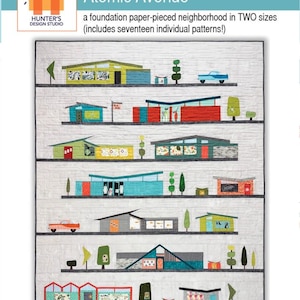 May include: A fabric quilt depicting a mid-century modern neighbourhood. The design features colourful houses, trees, and cars, with the text "Atomic Avenue" and "Hunter's Design Studio". The quilt includes seventeen individual patterns.