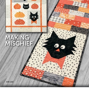 May include: A quilting pattern featuring a black cat with a red bow tie and the text "Making Mischief". The pattern is part of a collection called "Atkinson Designs: Simple Patterns - Tried and True".