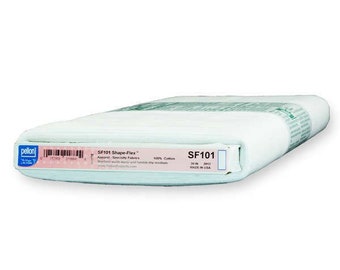 May include: A white Pellon SF101 Shape-Flex interfacing fabric roll with a green and white label. The label reads "SF101 Shape-Flex™ Apparel-Specialty Fabrics 100% Cotton 20 in. 2012 MADE IN USA".