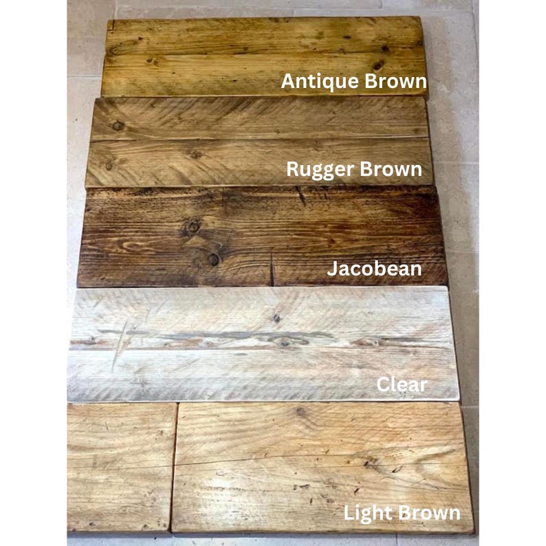 May include: Five wood samples stained in different colors: Antique Brown, Rugger Brown, Jacobean, Clear, and Light Brown.