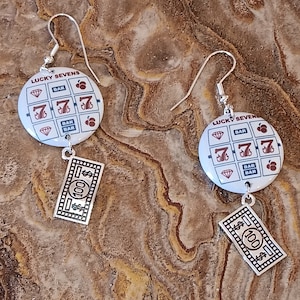 Lucky 7 Slot Machine w/ Money Charm Gambling Casino Game Jewelry Metal Button Novelty Earrings 1 inch diameter - 2 inches Long MADE in USA
