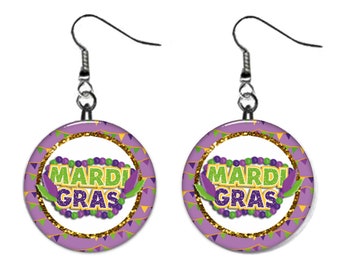 May include: Purple and gold Mardi Gras earrings with a purple, green, and gold beaded garland and the text "Mardi Gras" in green and purple letters.