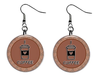 May include: A pair of brown and silver earrings with a coffee cup design and the text "I love coffee".