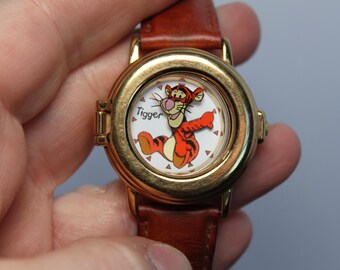 Montre Tigrou vintage à ressort. Disney, bracelet en cuir, pile à remplacer, modèle retiré de la vente, rare, pour les fans de Winnie l'Ourson, cadeau pour collectionneur ou hôtesse.