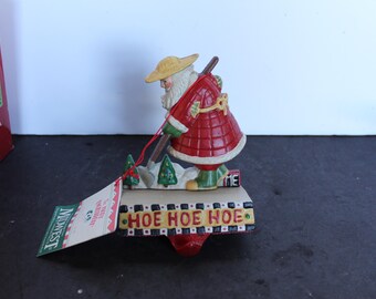 Vintage Gardening Santa Claus Stocking Holder. Cast Iron, Mary Engelbreit, In Original Box, MINT Condition, Grandmacore Christmas Mantel.
