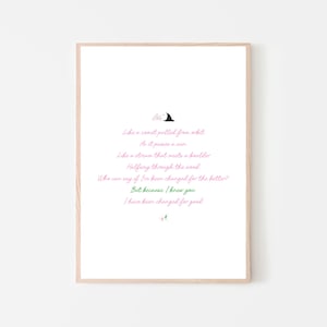 May include: A framed print with a light wood frame. The white background features a poem in pink and green text, with a small witch hat illustration. The poem's theme is about change and friendship.