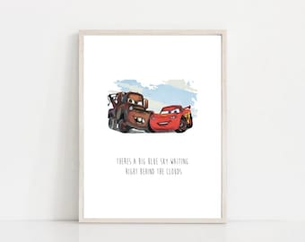 May include: A printable art print featuring a cartoon image of Lightning McQueen and Mater from the Disney Pixar Cars movie. The print has a blue and white watercolor background and the text "There's a big blue sky waiting right behind the clouds".