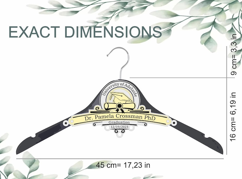 May include: A black wooden hanger with a yellow and gray University of Adelaide graduation design. The hanger is 17.23 inches long, 6.19 inches high, and 3.3 inches wide. The design includes a graduation cap, diploma, and the text "Dr. Pamela Crossman PhD" and "Graduation 12/19/2023".
