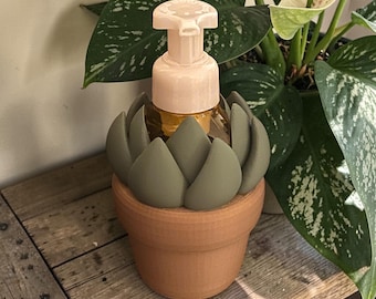 Jabonera espumosa con forma de planta suculenta