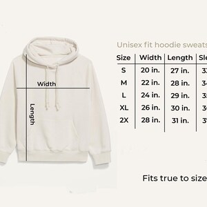 a white hoodie sweatshirt with measurements and a table indicating the size and length of the hoodie.