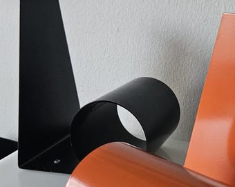 Vintage 60s Design Centre of London Matte Black Enameled Steel Coil &#39;Bookworm&#39; Pop Art Book Stand Book End Bookstand