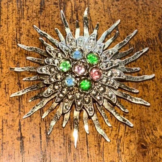 Vintage Little Nemo starburst brooch