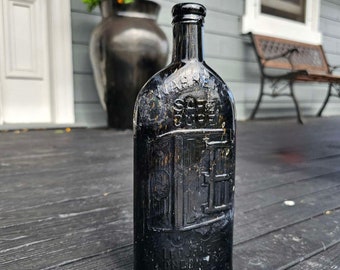 BLACK GLASS Antique WaRNeR'S SaFe Cure - Four Cities | Full of Bubbles! Apothecary Bottle Melbourne Australia | Rare Quack Medicine Bottle