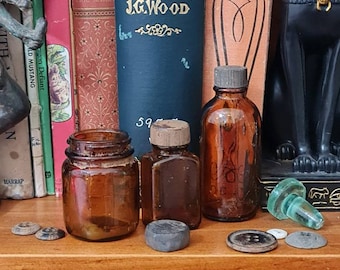 Three Vintage Amber Apothecary Bottles