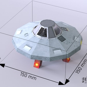 May include: A gray and white paper model of a flying saucer with a black cockpit and red landing gear. The model is 7.9 inches tall, 5.9 inches wide, and 5.9 inches long.