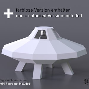 May include: White papercraft model of a UFO with a small window in the top. The text "farblose Version enthalten" and "non - coloured Version included" is printed above the UFO. The text "* Figur nicht enthalten" and "mini figure not included" is printed below the UFO. The text "getide let's make it" is printed below the UFO.