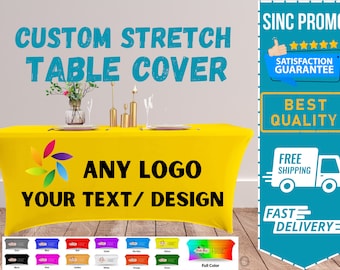 May include: Yellow stretch table cover with a colorful swirl design and the text "ANY LOGO YOUR TEXT/DESIGN".