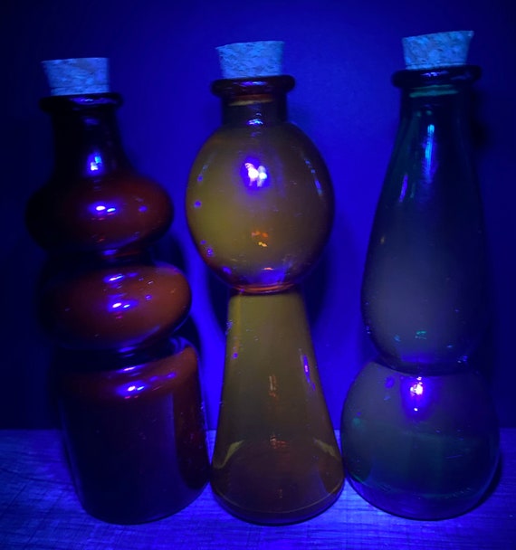 Set Of Glass Vials And Bottles With Multicolored Liquid Various