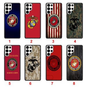 May include: Eight rectangular smartphone cases featuring various United States Marine Corps emblems. Designs include solid blue, red, and wood-grain backgrounds, vertical stripes, and camouflage patterns, all displaying the Eagle, Globe, and Anchor logo.