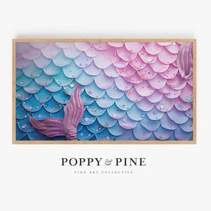 May include: A framed print of a mermaid tail made of iridescent blue, purple, and pink scales. The scales are arranged in a pattern that resembles fish scales. The tail is partially visible, with the tip of the tail pointing to the right.
