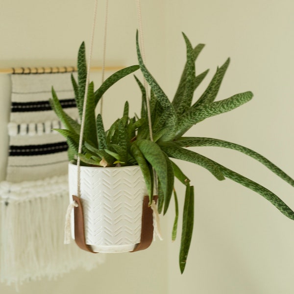Leather hanging pot holder with gold accents