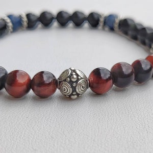 Elastic bracelet of black obsidian rainbow red tiger&#39;s eye beads and dumortierite