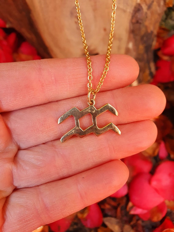 Aquarius star hotsell sign necklace
