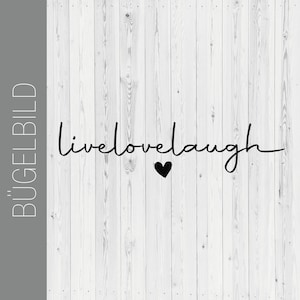 May include: Black and white typography on a white wood background with the text "live love laugh" and a small black heart.